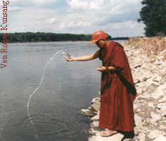Rinpoche blesses the Platte River, Nebraska, on his way to Osel Shen Phen Ling, August 97