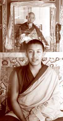 Zong Rinpoche before a picture of his previous incarnation.