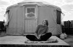 Petra McWilliams outside the yurt that was her home for 3 years