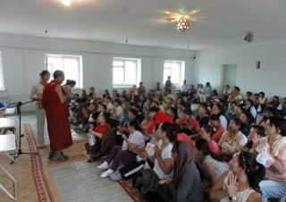 Panchen Otrul Rinpoche visiting a women's prison in Mongolia.