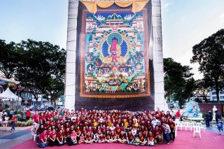 Amitabha Buddhist Centre, Singapore, has a beautiful 50 feet high thangka that they unfurl for celebrations. 
