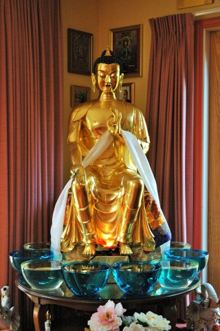 Life-sized gold leafed Maitreya statue, Kachoe Dechen Ling, California. 