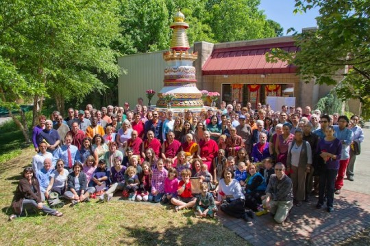 The Kadampa Center community with the finished stupa which took two years to complete. Photo by David Strevel. 