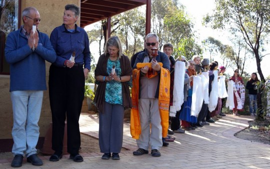 About 40 directors and SPC from FPMT centers, projects and services lined up to lead Rinpoche from Thubten Shedrup Ling Monastery to the Great Stupa to continue the oral transmission of the Golden Light Sutra, Australia, October 2014. Photo by Ven. Thubten Kunsang.