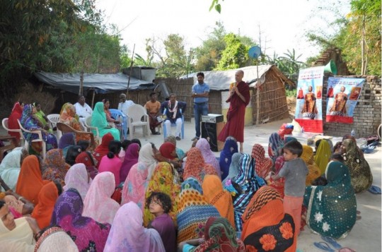 MPT Healthcare Program staff offer basic health education to villagers, Kushinagar, India, March 2014. Photo courtesy of Maitreya Project Trust.