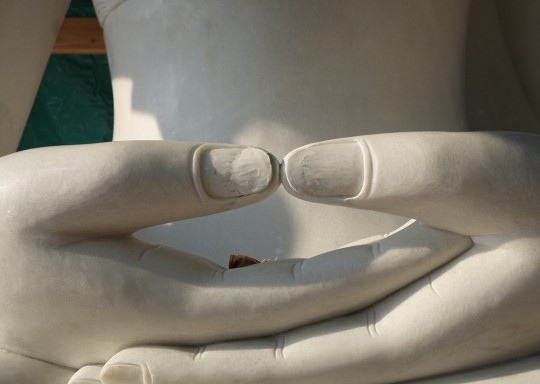 The thumbs of the statue also need to be extended to touch, Buddha Amitabha Pure Land, Washington, US, August 2014. Photo by Ven. Roger Kunsang.