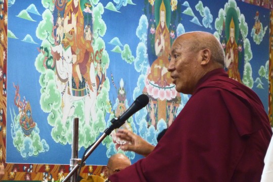 Geshe Lhakdor teaching at Tushita on Choekor Duchen, July 2014. Photo courtesy of Tushita Meditation Centre.