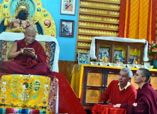 Jhado Rinpoche explores a tablet computer with Andy Wistreich and Geshe Kelsang Wangmo ready to assit, Dharamsala, India, July 2014. Photo courtesy of Tushita Meditation Centre.