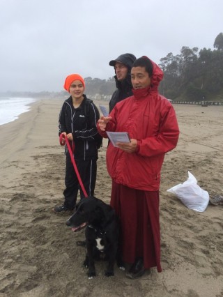 Sangha and students braved the cold Winter beach weather to bless beings in the ocean. Photo by Troy Stafford. 
