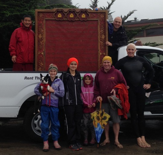 Sangha and students rented a truck and transported a large Namgyalma mantra board to bless beings in the ocean. Photo by Troy Stafford. 