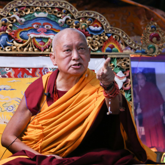 Lama Zopa Rinpoche teaching at Kopan Monastery, Nepal, December 2014. Photo by Ven. Roger Kunsang.