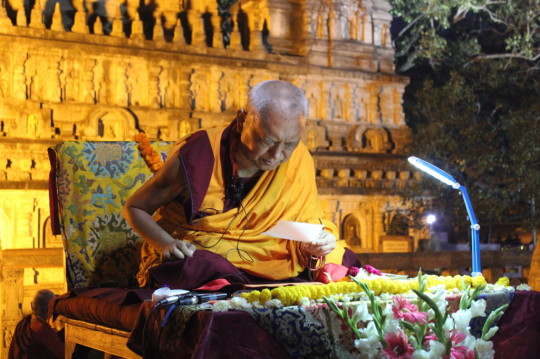 Lama Zopa Rinpoche giving the oral transmission of the Vajra Cutter Sutra at the Mahabodhi Stupa, Bodhgaya, India, March 2015. Photo by Ven. Lobsang Sherab.