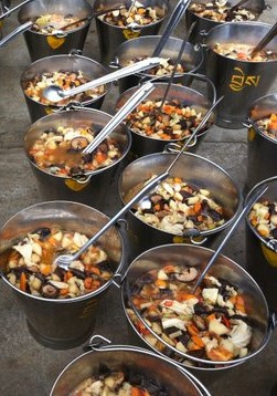 Buckets of soup about to be offered to the 2,500 monks of Sera Je Monastery. 