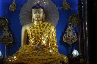Robes Offered to Buddha Statue in Mahabodhi Temple Every Month
