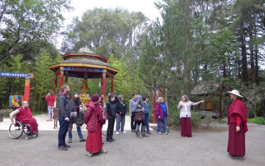 Kshitigarba statue and Foundation Service Seminar participants at Land of Medicine Buddha, California, January 2015. Photo by Laura Miller.