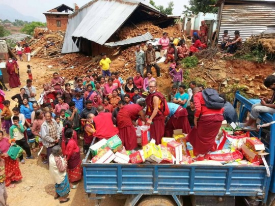 Kopan monks distribute aid to villagers after earthquake, Nepal, May 1, 2015. Photo via Ven. Nawang Thinley's Facebook page.