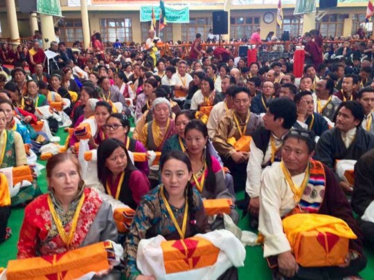 Drolkar McCallum, FPMT North America regional coordinator, waits with others to be part of the procession of offerings during the long life ceremony for His Holiness the Dalai Lama, Dharamsala, India, June 21, 2015
