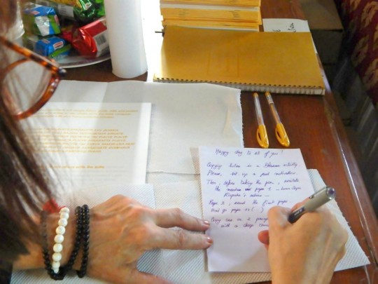 Lay students copied out the Sutra of Golden Light during the consecration and other events, Choe Khor Sum Ling, Bangalore, India, April 2015. Photo by Jeffrey Butts.