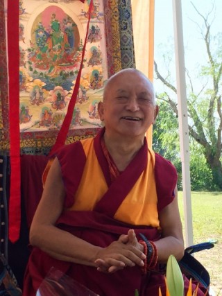 Lama Zopa Rinpoche teaching during picnic in park on Long Island, New York, August 2015. Photo by Ven. Yangchen.