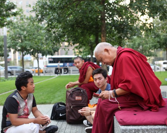 Lama Zopa Rinpoche with former Kopan monks doing prayers at the 9/11 Memorial in New York City, US, September 2015. Photo by Ven. Lobsang Sherab.