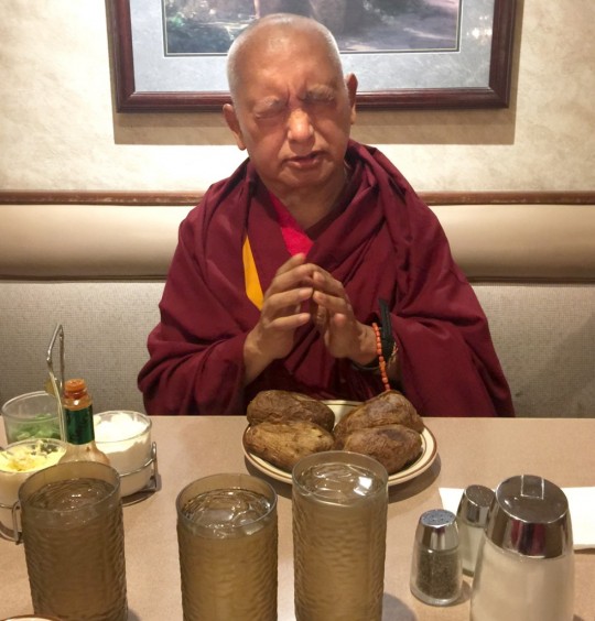 Lama Zopa Rinpoche blessing and offering a meal in California. November, 2015. Photo by Ven. Thubten Kunsang. 