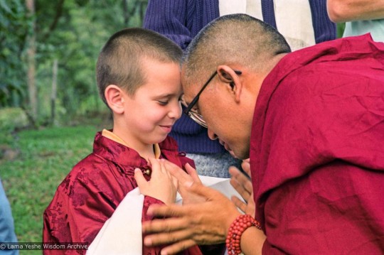 Lama Zopa Rinpoche with Tenzin Osel Hita at Chenrezig Institute, Australia, 1991. Photo by  Thubten Yeshe.