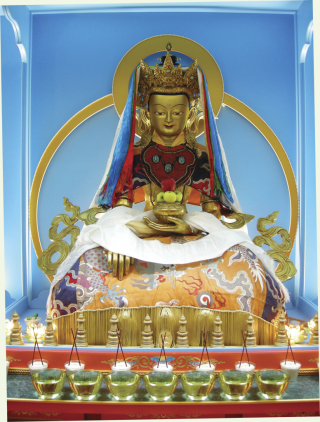 Shakyamuni Buddha in sambhogakaya aspect with offerings in the jokhang of Maitripa College. Photo by Noah Gunnell.