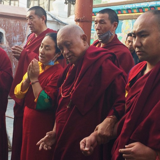 Lama Zopa Rinpoche and Khadro-la making prayers at Boudhanath, Nepal, February 2016