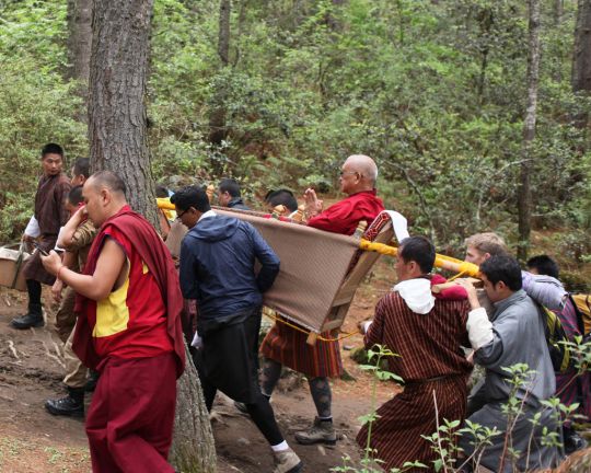 Twelve men carried the palanquin Lama Zopa Rinpoche needed to make the three-hour journey to Tiger's Nest Monastery, Bhutan, May 2016. Photo by Ven. Lobsang Sherab.