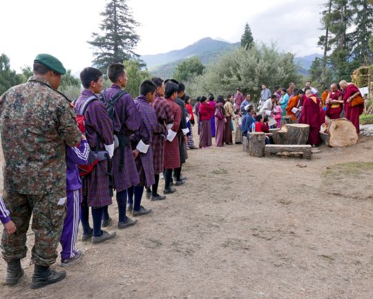 The line became longer and longer to receive blessings from Lama Zopa Rinpoche at the flower show, Paro, Bhutan, June 2016. Photo by Ven. Roger Kunsang.