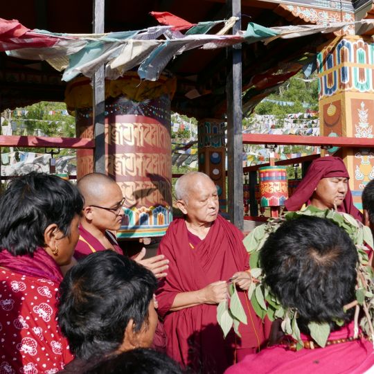 Lama Zopa Rinpoche offering blessing strings and Namgyälma protections at Drakarpo, the holy site of Guru Rinpoche’s body, Paro, Bhutan, June 2016. Photos by Ven. Roger Kunsang.