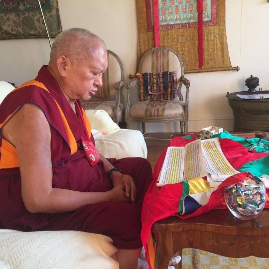 Lama Zopa Rinpoche reciting Arya Sanghata Sutra for Ven. Kunsang, July 2016. Photo by Ven. Roger Kunsang via Twitter.