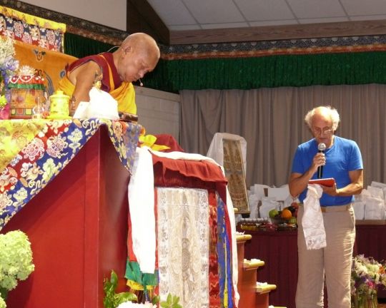 Lama Zopa Rinpoche with Nick Ribush, director of Lama Yeshe Wisdom Archive, reading praises he wrote for Rinpoche, Light of the Path retreat, North Carolina, US, August 2016. Photo courtesy of LYWA.