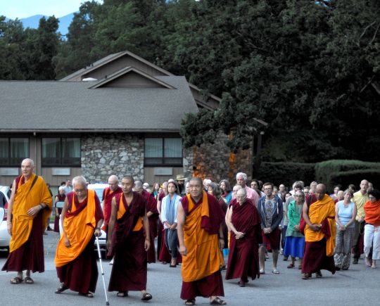 Lama Zopa Rinpoche leading walking meditation at Light of the Path, Black Mountain, North Carolina, US, August 2016. Photo by Ven. Lobsang Sherab.