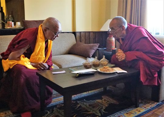 Lama Zopa Rinpoche and Rizong Rinpoche enjoy a conversation at Kopan monastery, Nepal, November 2016. Photo by Ven. Lobsang Sherab.