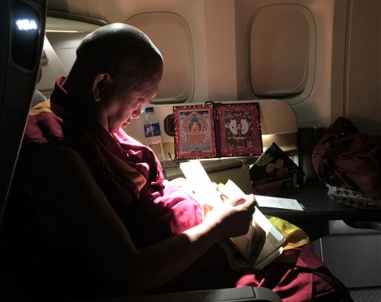 Lama Zopa Rinpoche traveling by air, 2016.