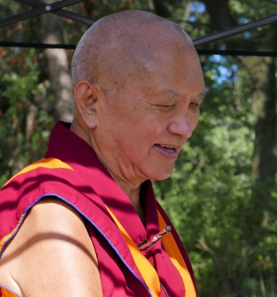 Lama Zopa Rinpoche teaching during a picnic in the park, New York, USA, August 2016. Photo by Ven. Roger Kunsang.