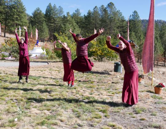 Sangha jumping for joy at Buddha Amitabha Pure Land, Washington State, USA, November 2016. Photo by Ven. Roger Kunsang.
