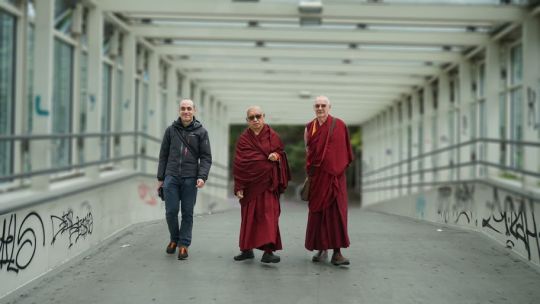 Markus Igel, Lama Zopa Rinpoche and Ven. Roger walking to subway in Vienna, Austria, September 2017. Photograph by Lobsang Sherab.