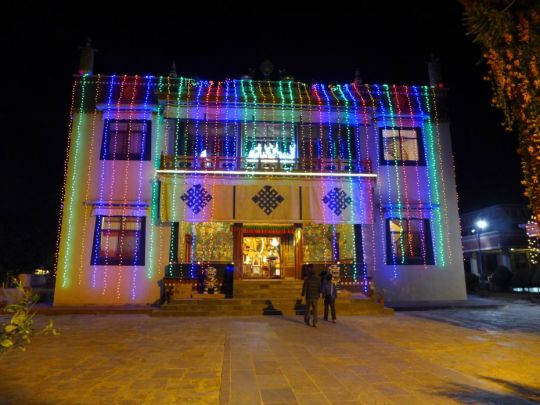 The main gompa at Kopan Monastery decorated with offering lights on Lama Tsongkhapa Day, Kopan Monastery, Nepal, December 2016. Photo by Laura Miller.