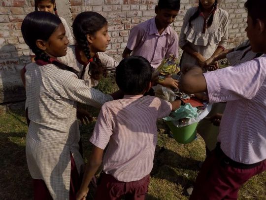 Children collecting trash Maitreya School April 2018 by Pema Tsering