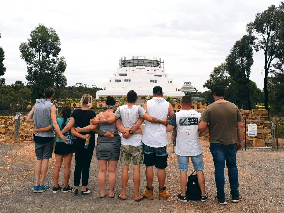 alcohol-and-other-drugs-program-participants-gazing-with-arms-locked-at-the-great-stupa-of-universal-compassion-in-bendigo-australia-january-2019-by-alyce-crosbie