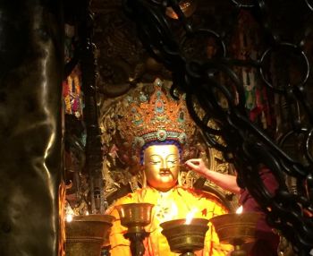 Monthly Offering of Gold and Robes to Precious Buddha Statue in Tibet