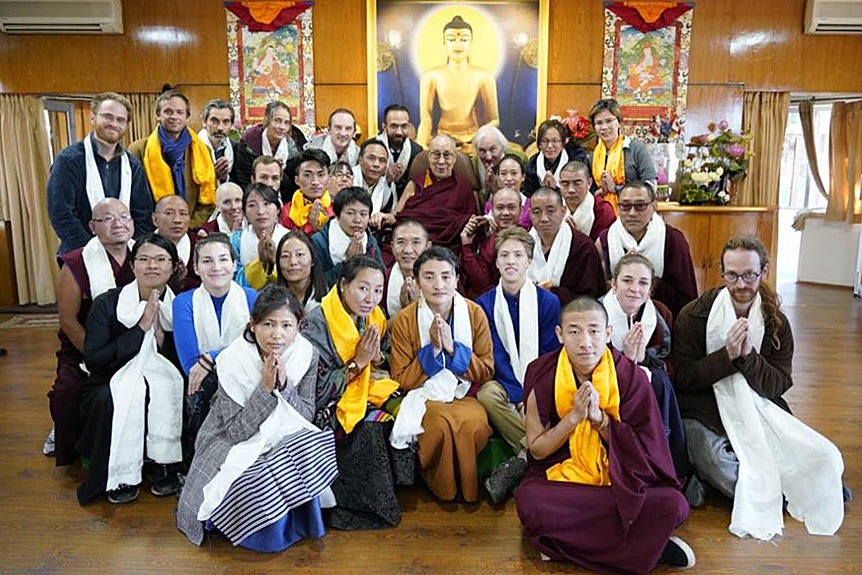 A large group from LRZTP posed for a group photo with His Holiness the Dalai Lama in the center of the photo.