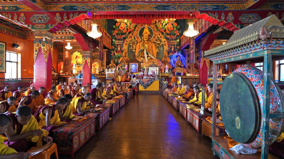 Monks in Kopan gompa doing puja