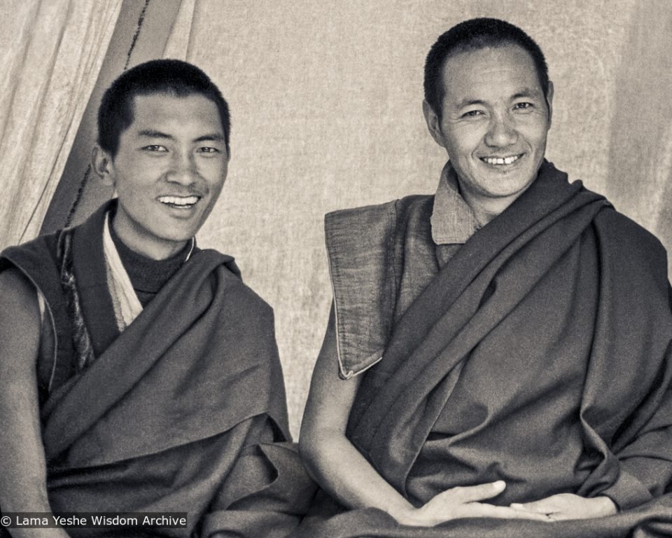 black and white photo of Lama Zopa Rinpoche and Lama Yeshe who are both smiling in 1972