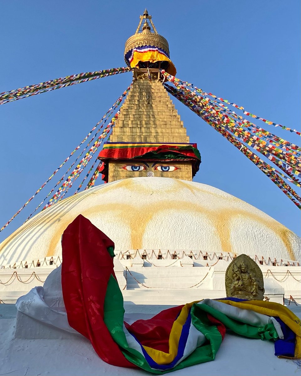 Boudha Stupa with khata and tsa-tsa offerings and