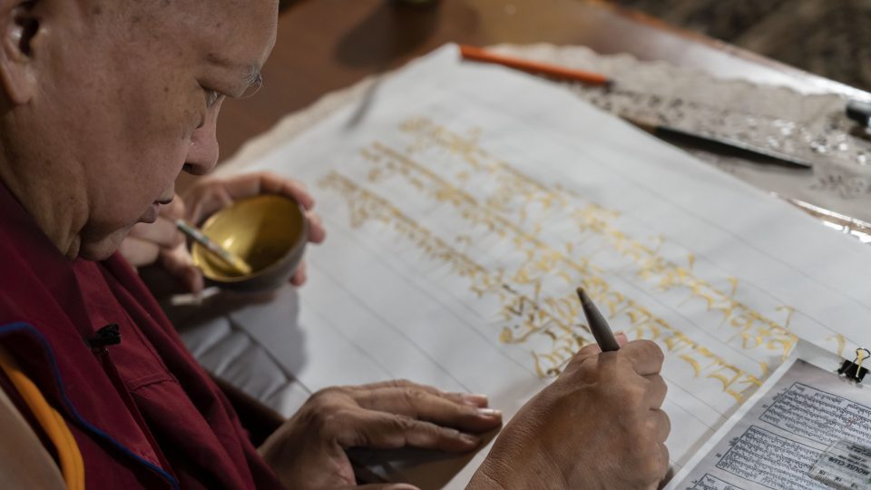 Lama Zopa Rinpoche writing out the Prajnaparamita in pure gold