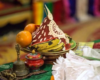 torma and fruit tsog offering with other puja implements