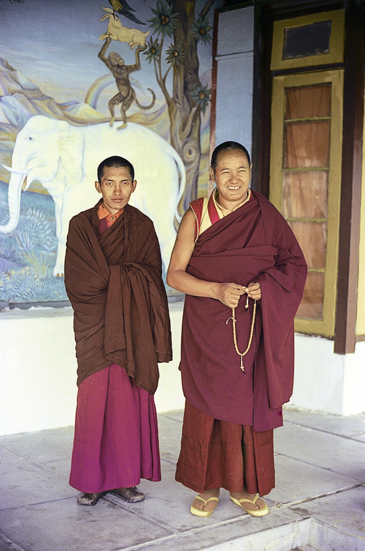 Lama Yeshe and Lama Zopa Rinpoche with Lawrence’s painting of the Four Harmonious Friends
